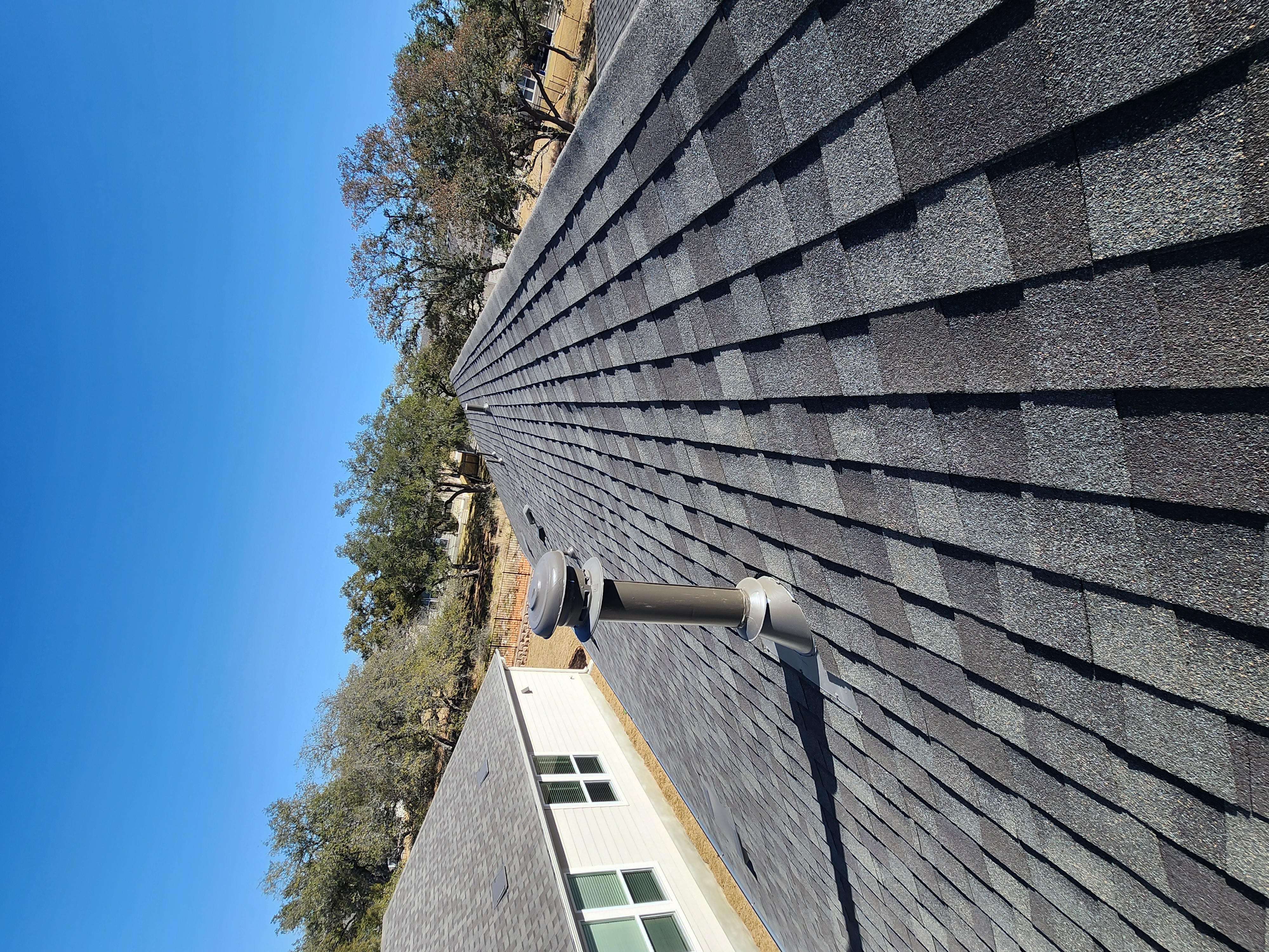 Home inspector performing a final walkthrough inspection of a newly built home in Adamsville, TX.